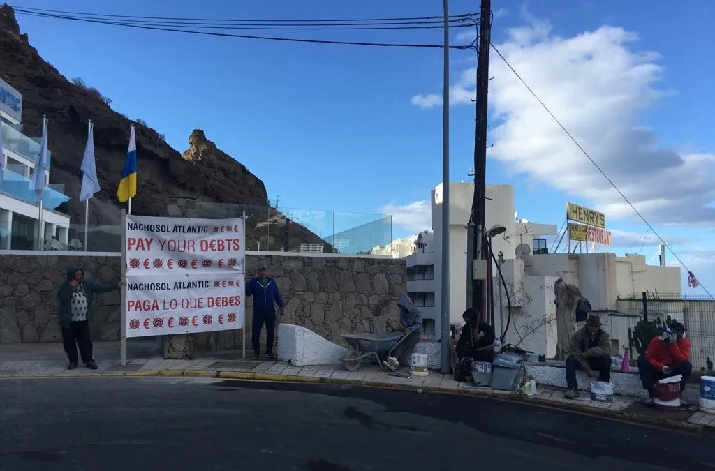 Noisy demonstration by construction workers outside Puerto Rico hotel