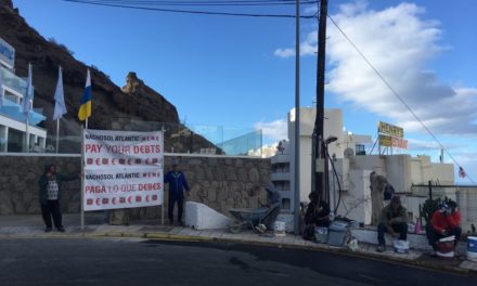 Noisy demonstration by construction workers outside Puerto Rico hotel