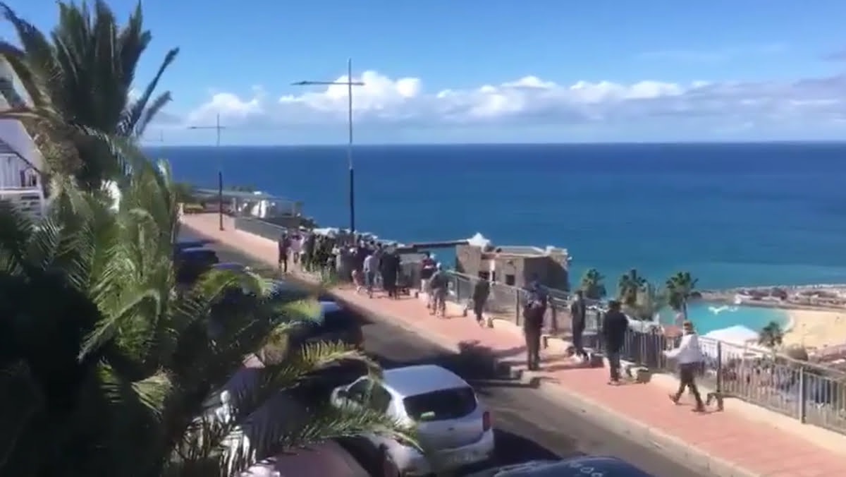 30-40 North African migrants march in brief Puerto Rico protest overlooking Amadores Beach in Mogán